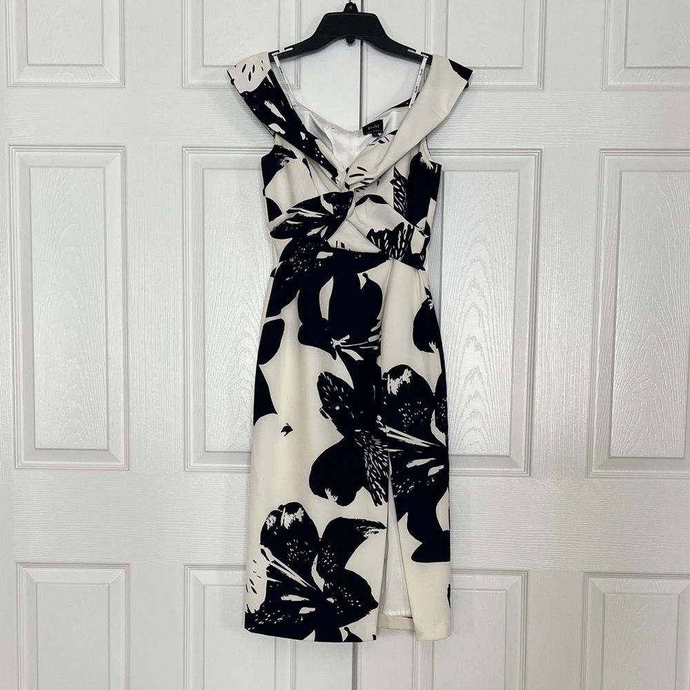 Bardot White Midi Dress with Bold Black Floral Print With Twisted Bodice Detail